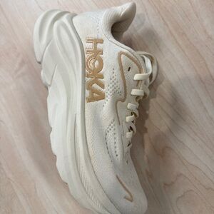 Hoka Cream and Gold Running Shoes